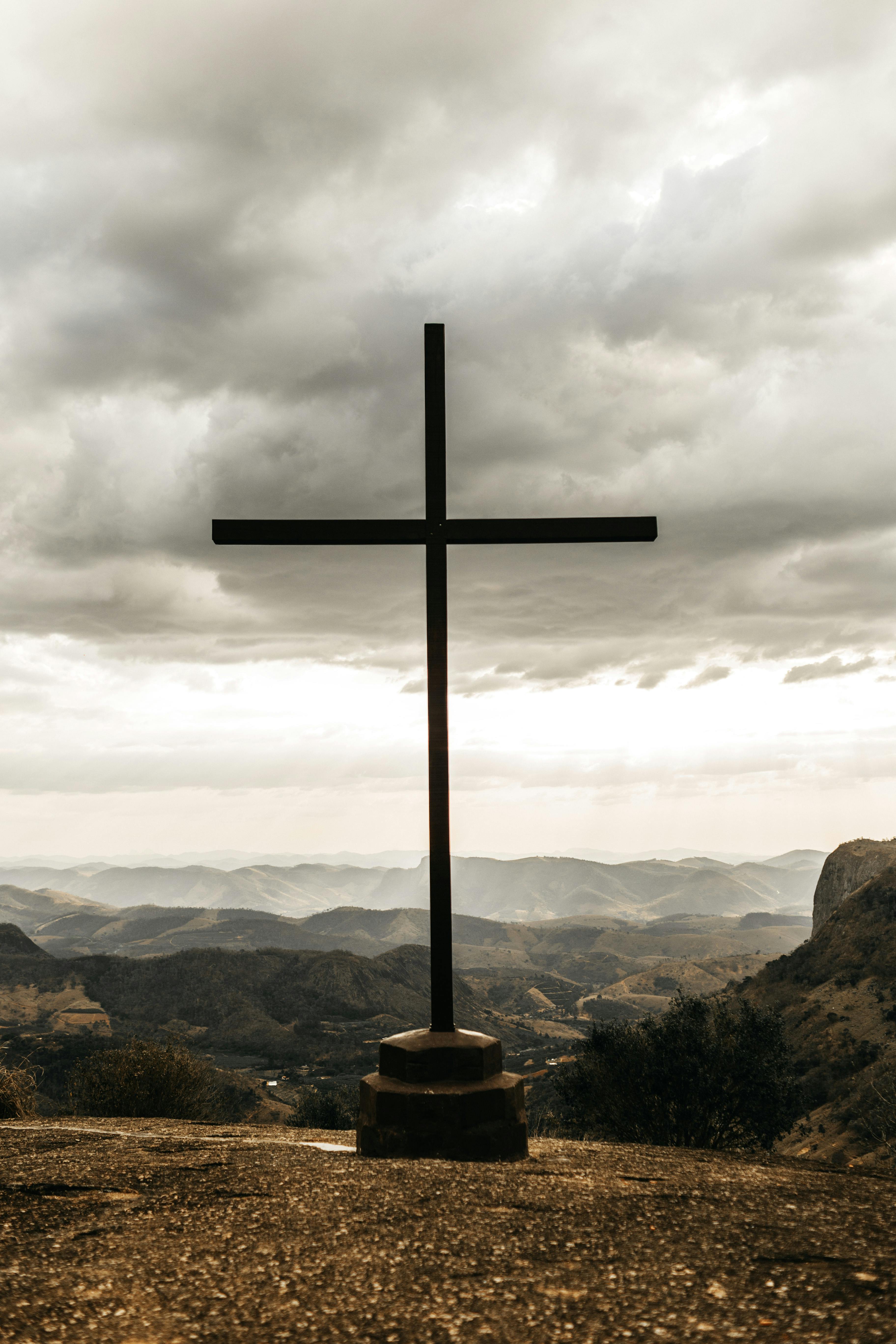 A cross standing on a rock